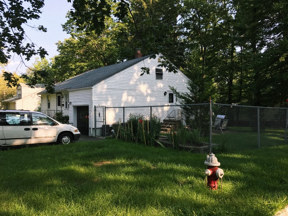 Photo of house and fire hydrant