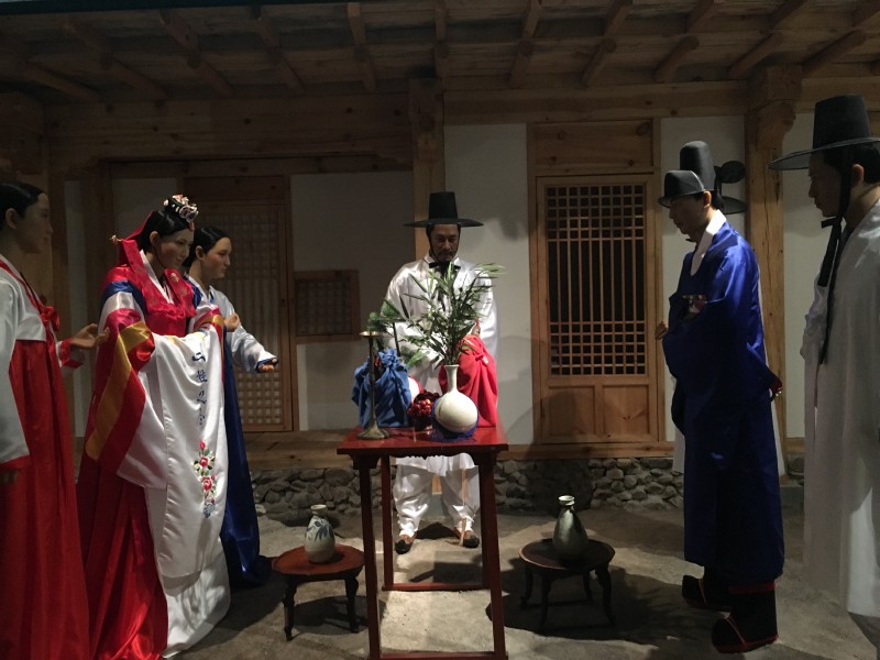Photo of wax recreation of traditional Korean marriage ceremony