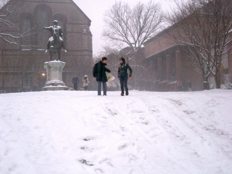 Photo of two people in snow