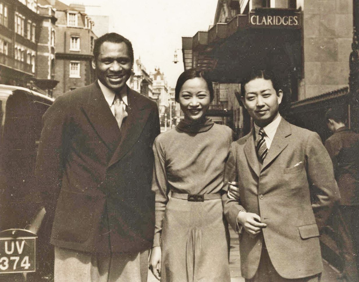 Image of Africa-American man and Asian couple